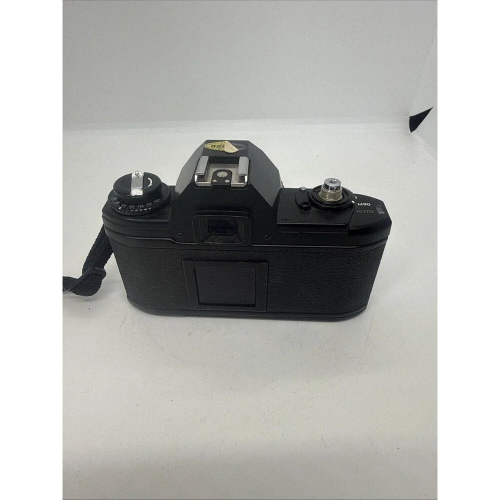 Vintage Nikon EM Black SLR Film Camera with Nikon Lens